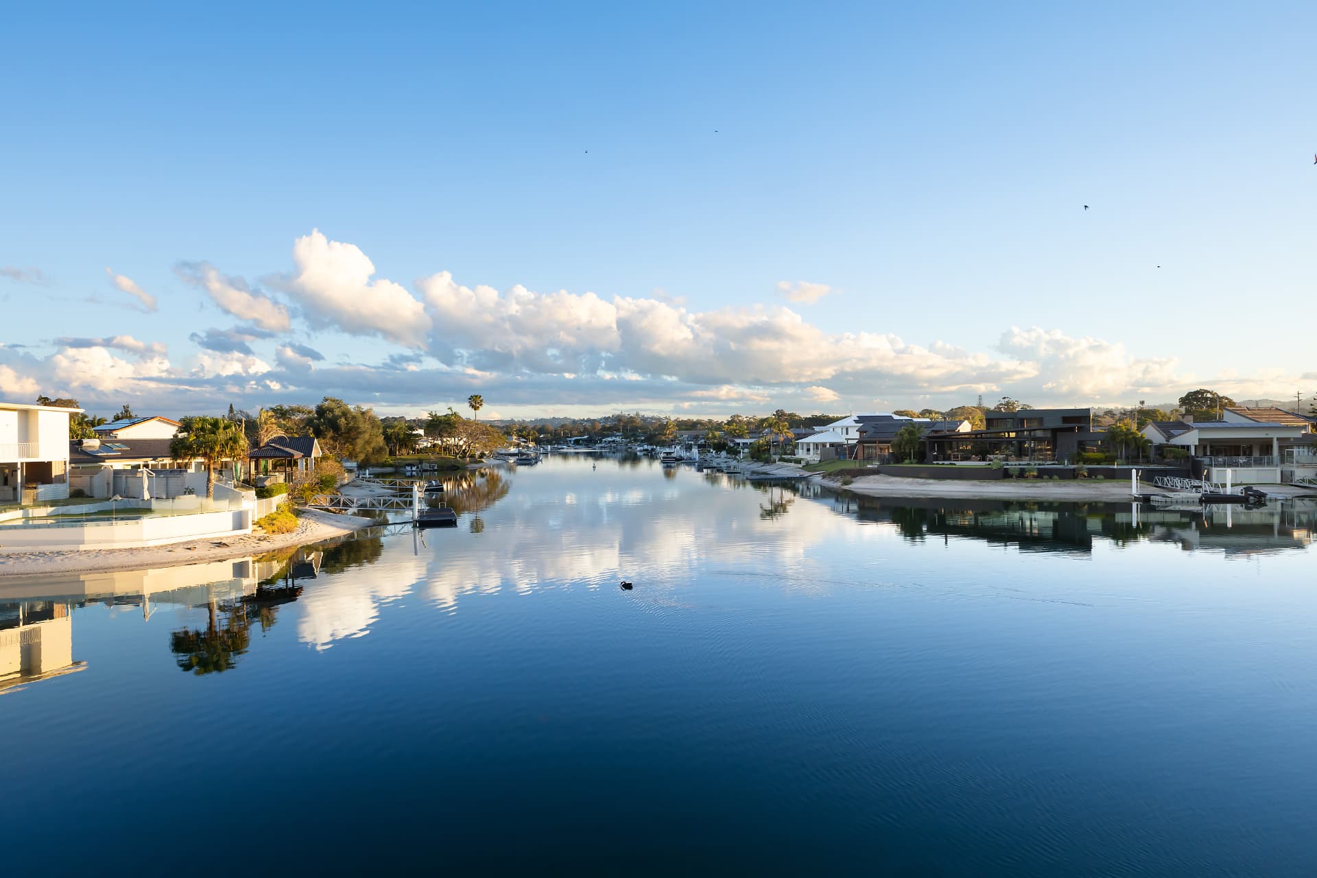 The canal at Tweed Heads, flat water and morning cloud reflected
