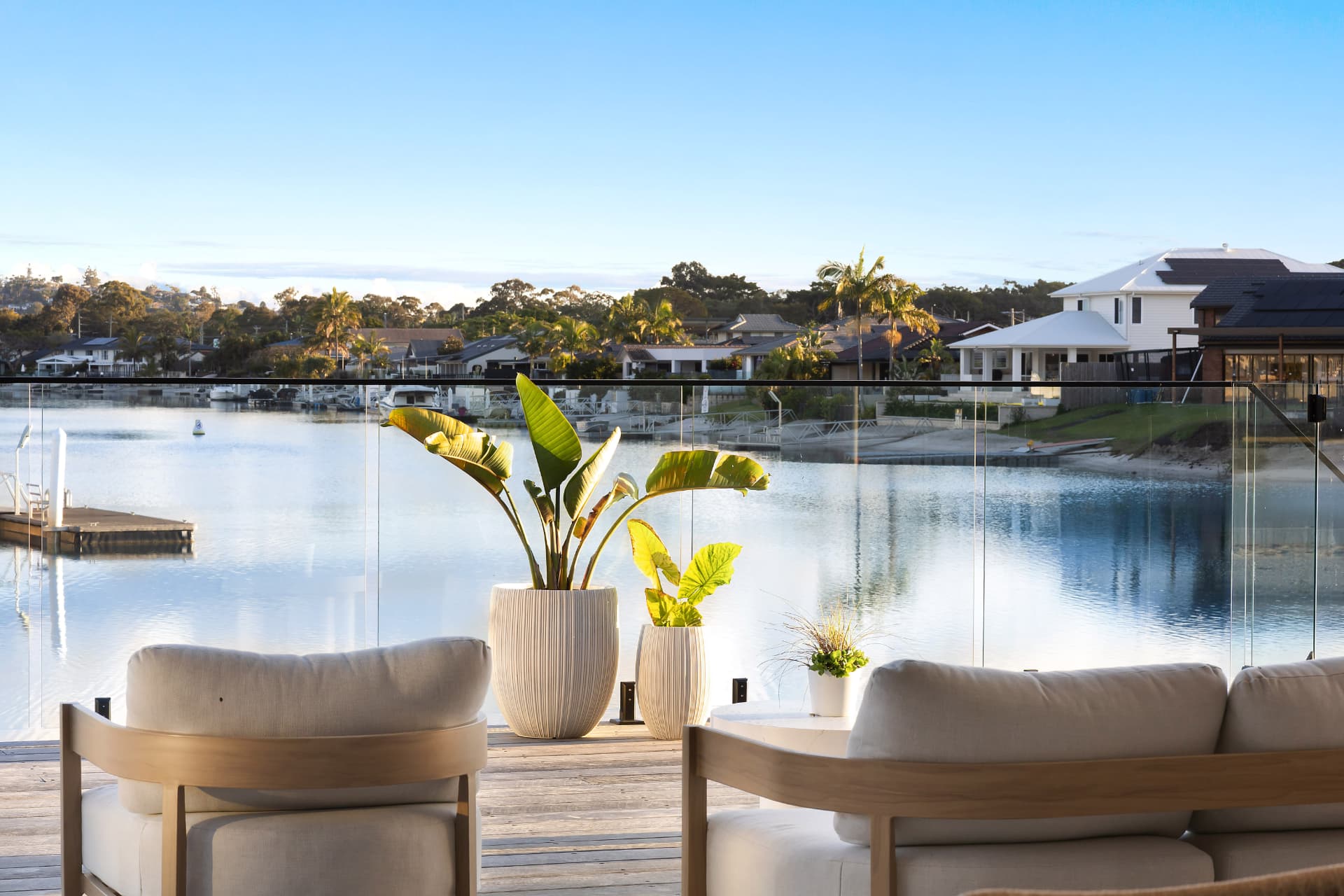Outdoor lounge on the deck looking across the canal to the houses opposite